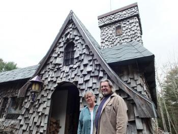 Jenny and David Lee have lived in the peculiar cottage in East Boothbay for nearly 20 years. Their home’s odd features still attract many daily visitors. RYAN LEIGHTON/Boothbay Register