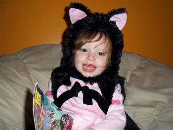 Fluffy Kitty Cat: Miss Emma Rose dresses up as a kitty cat as she reads up on her Halloween stories before heading out to trick-or-treat. Emma’s father Nick Scott entered her in the Boothbay Register’s Halloween Costume contest and won $100 from McSeagull’s. Courtesy of Nick Scott