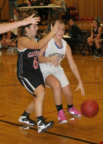 Junior guard Ashley Reed is heavily guarded in Monday’s scrimmage against Gardiner. KEVIN BURNHAM/Boothbay Register Reed