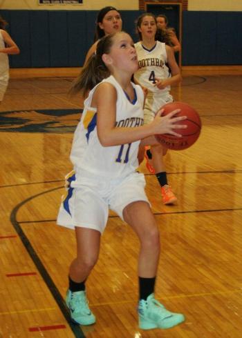 Sara Durgan gets ready to put in a layup in Monday’s scrimmage. KEVIN BURNHAM/Boothbay Register Durgan