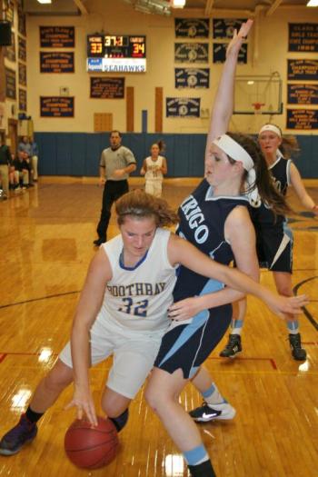 Freshman Cagney O’Brien tries to drive to the basket late in Wednesday’s game at home against Dirigo. KEVIN BURNHAM/Boothbay Register O’Brien