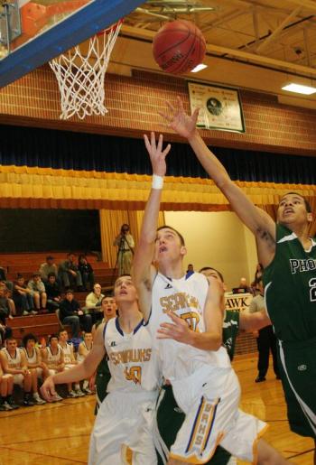 Evan Hepburn puts up an underhand shot – it went in – in the second half of Thursday’s game against Spruce Mountain. KEVIN BURNHAM/Boothbay Register Hepburn, Evan