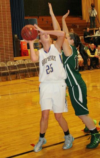 Freshman forward Nicole Clarke gets pressured on a shot attempt by a Phoenix player on Wednesday night at Boothbay Region High School. KEVIN BURNHAM/Boothbay Register Clarke