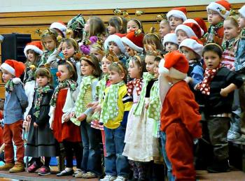 Kindergarteners sing “Here Comes Santa Claus” at the holiday concert at BRES. KATRINA CLARK/Boothbay Register
