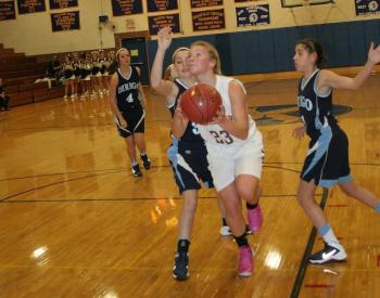 Lady Seahawk junior Morgan Crocker drives to the basket in the second quarter of Wednesday’s game at home against Dirigo. Crocker led all scorers with 23 points but the Cougars prevailed, 36-34. KEVIN BURNHAM/Boothbay Register Crocker