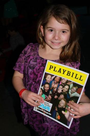 Della Hahn poses on the red carpet with this year's JFT PLAYBILL. Courtesy of Emily Mirabile