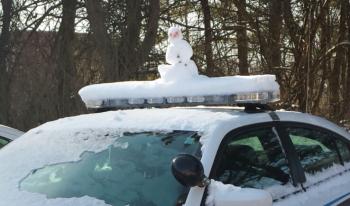 cop car snowman frosty