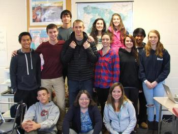 Heading to Central America: front from left, Andrew Hallinan, teacher Karol Clark, Saida Riddell; second row, from left, Jude Alamo, Jacob Leonard, Benn Scully, Hannah Winslow, Brooke Alley and Hannah Morley; back row: Gabriel Purin, Sophia Thayer, Kate Friant and Karl Alamo. SUZI THAYER/Boothbay Register