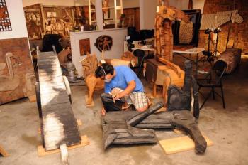 BEN CAGUIOA, of International Artifacts, working for Kohler Foundation in Langlais’ studio in Cushing last summer. Courtesy of Kohler Foundation