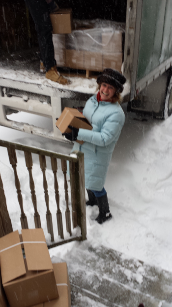Chamber President Catherine Wygant Fossett unloads the 2014 Region Guides on a recent wintry day. Courtesy of the Boothbay Harbor Region Chamber of Commerce