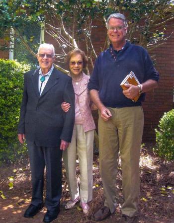 Jimmy and Rosalynn Carter, with Bruce Barlow outside the church where Carter teaches Sunday school classes. Courtesy of Bruce Barlow
