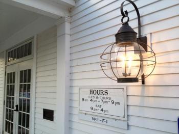 THIS STYLISH outdoor wall sconce light the way to the new front door. RYAN LEIGHTON/Boothbay Register