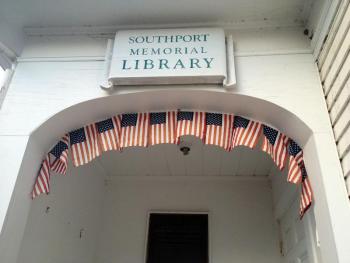 THE ENTRANCE to the older part of the library, originally a one room schoolhouse. RYAN LEIGHTON/Boothbay Register