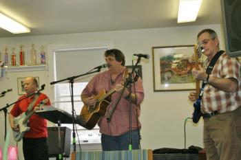 Garry Blackman, Tim Sprague and Dick Spofford provide music for the fundraiser. KEVIN BURNHAM/Boothbay Register