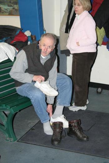 Jim Botti changes into his walking sneakers at the YMCA on March 25. KEVIN BURNHAM/Boothbay Register