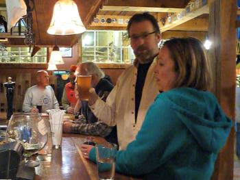 Patrons enjoy a glass of Lions Tale at the Watershed Tavern bar. KATRINA CLARK/Boothbay Register