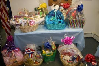 Baskets of items for the raffle. KEVIN BURNHAM/Boothbay Register