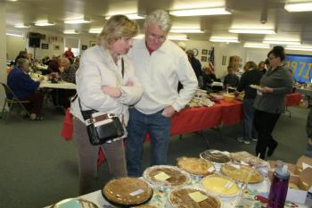 Ginny and Bob Spurgin get ready to buy a pie. KEVIN BURNHAM/Boothbay Register