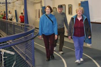 Sharon Barter, left, walks with Ira and Connie Machon on the YMCA track on Tuesday, March 25. KEVIN BURNHAM/Boothbay Register