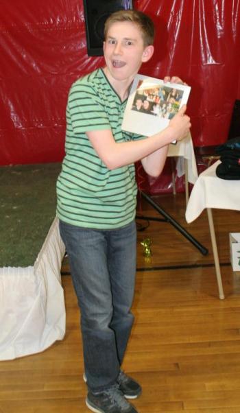 Rick Hilscher has a little fun after receiving one of the two Youth of the Year Awards. KEVIN BURNHAM/Boothbay Register Hilscher