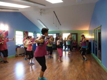 Instructor Sarah Brewer leads attendees in a Zumba dance. KATRINA CLARK/Boothbay Register