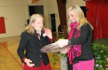 The Rev. Dr. Sarah Foulger, left, receives the YMCA’s highest award, the Character Development Award, from Meagan Hamblett, membership and marketing director, at the Boothbay Region YMCA’s 34th annual dinner meeting on Tuesday, April 8. Foulger was honored for her tireless work with Boothbay Region Community Resources groups, within the community and as a YMCA board member. The annual gathering drew over 130 Y supporters, volunteers and staff members. KEVIN BURNHAM/Boothbay Register Foulger