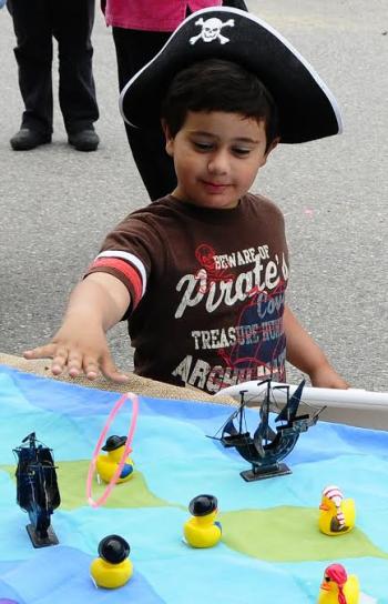 This young pirate is enjoying one of the many activities available for children at the Kid’s Pirate Camp during a past Damariscotta River Pirate Rendezvous. Local nonprofits and individuals supporting them are invited to lend a hand at the Camp in return for a share of the “treasure” earned there during the event to be donated to the nonprofit.