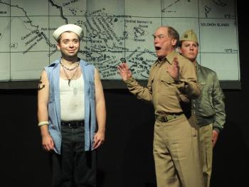 George Bishop as Capt. Brackett, left, reprimands Luther Billis for his "diversionary tactics." Roosevelt Bishop (Lt. Buzz Adams) stands at attention (you'd better believe it) behind the Capt. LISA KRISTOFF/Boothbay Register
