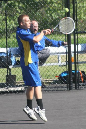 Second doubles player Duncan Drapeau returns a backhand shot. KEVIN BURNHAM/Boothbay Register