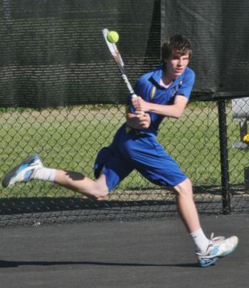 First singles player Nick Gorey returns a backhand. KEVIN BURNHAM/Boothbay Register