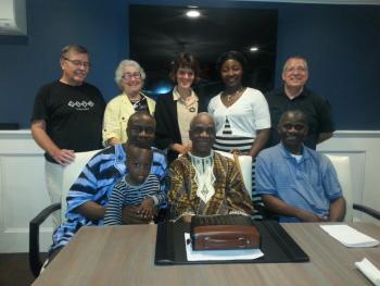 Some of the presenters at the summit held at Newagen Seaside Inn. Pictured from left are, back row: Professor Ralph Kee of Gordon Conwell Theological Seminary, Boston, Mass. campus; the Rev. Judith Kee, MPH, Universal Human Rights International (UHRI) Boston, Mass.; Dr. Carmen E. Aldinger, MPH, consultant to UN agencies and nonprofit organizations; Saawile Krua, wife of Torli Krua; Dr. Gregg Detwiler, director, intercultural ministries, Emmanuel Gospel, center; front row: Torli H. Krua, founder, YOUNG-Africa (holding his son, Mahn); the Rev. Mahn C. Krua Sr., proprietor, Ziah Mission School-Liberia; Michael Mendoabor, manager, High Tech Applications Liberia. Courtesy of Torli H. Krua