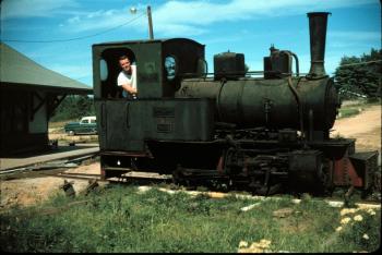 George McEvoy looks out from one of the first trains brought to the Boothbay Railway Village in the early 1960s. Courtesy of Bob Ryan