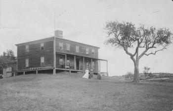 A 1919 photo of the old gray house on Sawyers Island, its rotting porch sagging before replacement. Courtesy of Sally Leach Sewall and Susan Leach