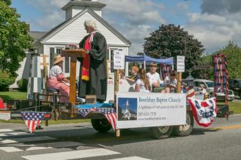 The Boothbay Baptist Church float, seen here as it passes by the church, took first place in the street parade. Courtesy of Michael Leonard