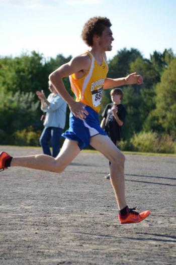 Matt Burnham grimaces as he strides to the finish line at UMaine Augusta on Wednesday. Courtesy of Dr. Aqui Alamo Photo of Matt Burnham