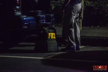 An FBI agent arrives on the scene and prepares to get to work. (Courtesy Isaac Remsen)