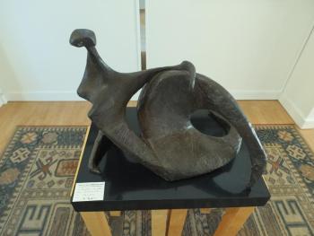 Seated figure in bronze, Roger Milinowski