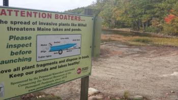 SIGNS LIKE this one (located at Biscay Beach) are just one of the tools used by the Pemaquid Watershed Association to warn boaters about invasive species clinging onto the hulls of boats. There have been no recorded incidents of hydrilla recorded at one of the PWA ponds this year, Executive Director Donna Minnis said. Notice the great blue heron? BEN BULKELEY/Wiscasset Newspaper