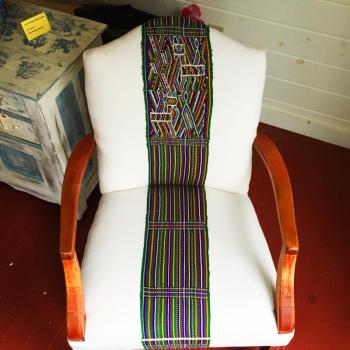 A chair upholstered by Kerr and Jones, with a woven belt from Guatemala running up the center. SUZI THAYER/Boothbay Register