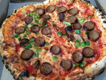 Hot sausage pizza from Mel’s Place. SUZI THAYER/Boothbay Register