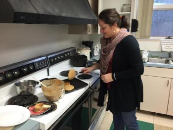 Carrie Eason, membership services and front desk supervisor, flips pancakes in the YMCA’s kitchen on Nov. 17. SUZI THAYER/Boothbay Register