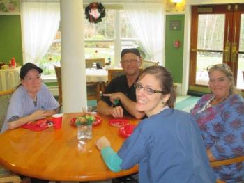 The St. Andrews Village kitchen staff, clockwise from left, Linda Marchand,Sean Ronan, Amy Ronan and Taryn Lee, at the Dec. 11 Christmas party. Courtesy of Barbara Marr