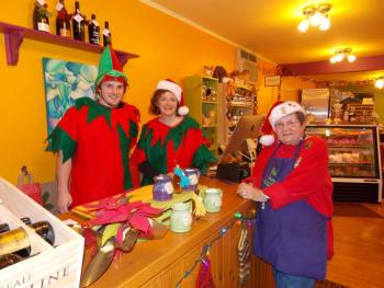A trio of holiday elves at Eventide during Men’s Night. From left: Ron Finlay, Kristen McEvoy and Mim Martin. KATRINA CLARK/Boothbay Register