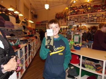 Chris Hamblett finds the perfect pair of socks for his sister Lincoln during Men’s Night at Jansons. KATRINA CLARK/Boothbay Register