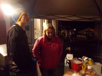 Stephanie Hawke and David Machon man the grill at Janson’s Clothing Store. KATRINA CLARK/Boothbay Register