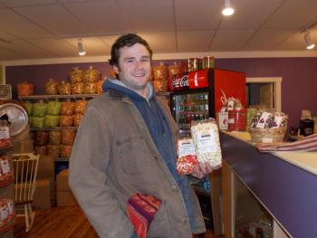 John Miller buys popcorn to send to his dad and two sisters in New York. KATRINA CLARK/Boothbay Register