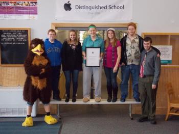 The students who created the iBook which gained Boothbay Region High School the title of Apple Distinguished School. From left: Camden Spear (in Seahawk costume), Tyler Field, Anna Baumm, Courtney Brewer, Lisa Pawlowski, Dominick Thompson and Jacob Bishopp. Not pictured: Kenny Hicks. KATRINA CLARK/Boothbay Register