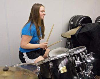 Charlene Reed on drums during the “learn a new instrument” elective. KATRINA CLARK/Wiscasset Newspaper