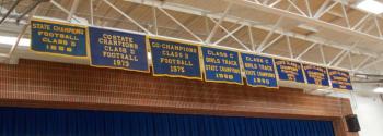 (Most of) the state championship banners are up again in the Boothbay Region High School gym. KATRINA CLARK/Boothbay Register
