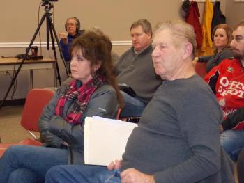 Rebecca and Doug Carter ask the selectmen for a settlement on their tax-acquired land purchase from 2013, which was stated as 1.3 acres and turned out to be just one acre. KATRINA CLARK/Boothbay Register